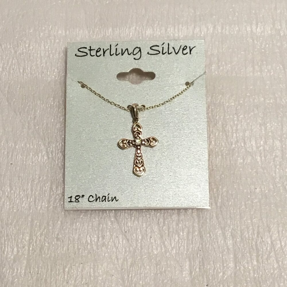 Very lovely sterling silver necklace featuring a cross w/ a CZ stone - Perfect!